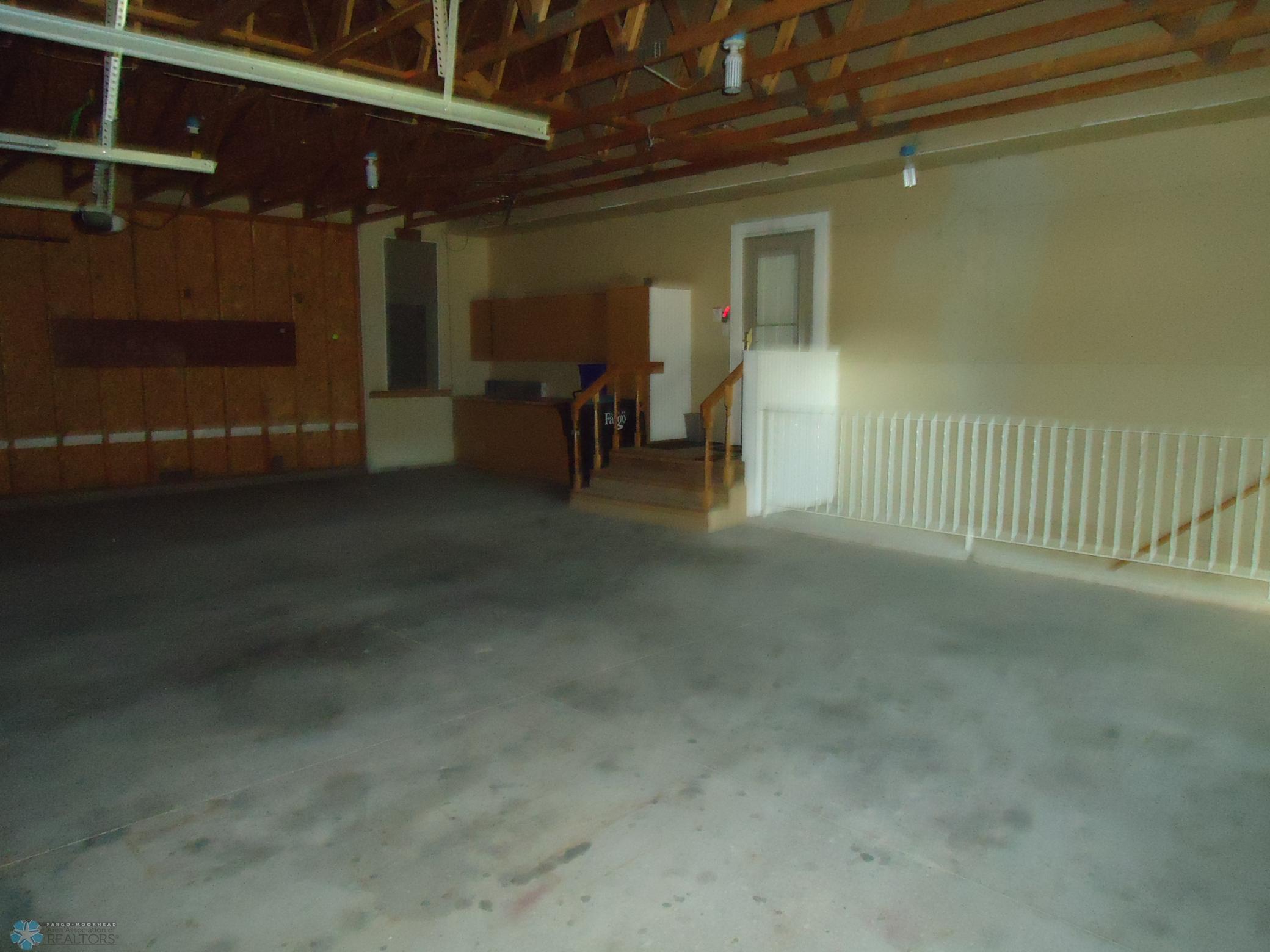 stairs to basement from garage