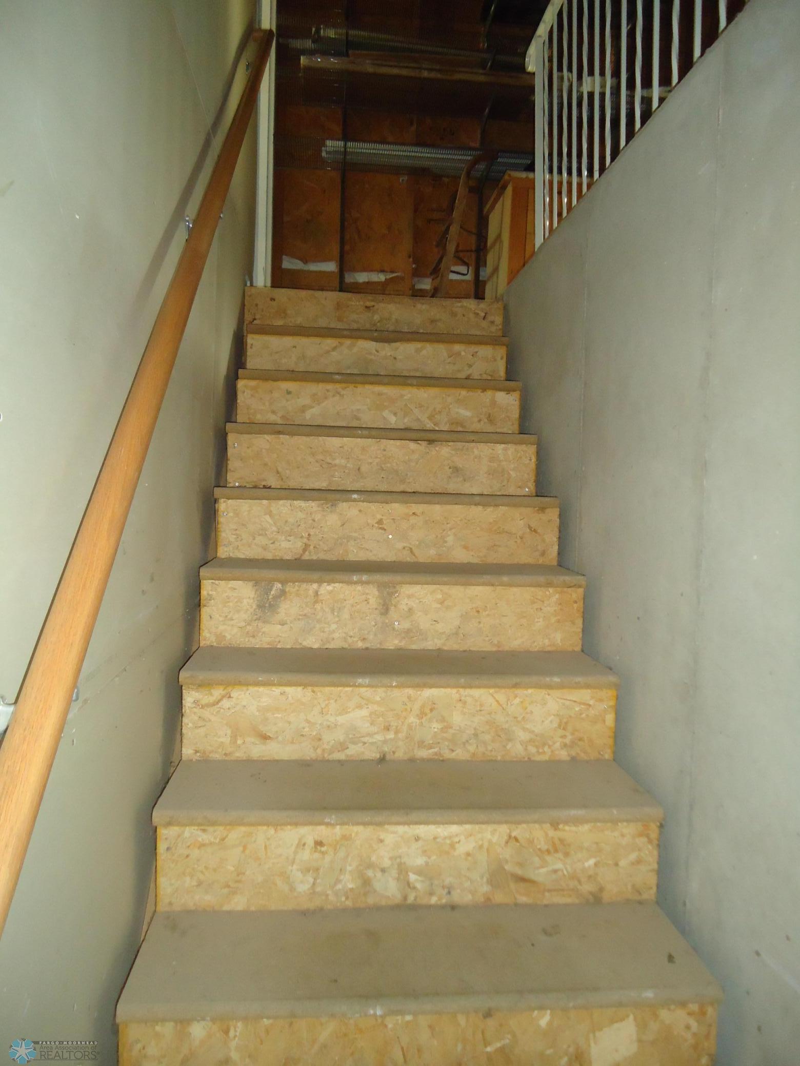 stairs to family rm from gar