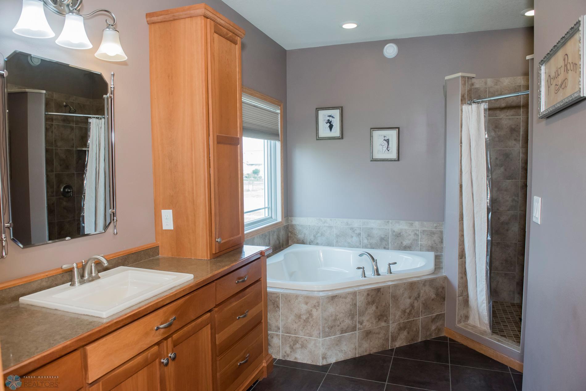 Primary bath with soaking tub & tile shower