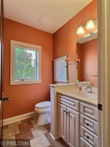 This cute half bath is in the lower level.