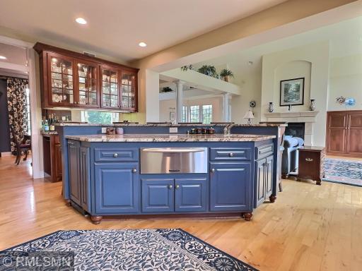 The custom craftsmanship in this home is amazing. Custom cabinets, with warming drawer and trash compactor.