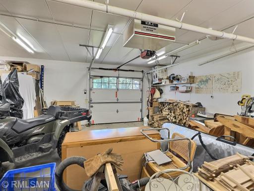 Lower garage provides excellent temperature-controlled storage with in-floor heating. This area sits directly below the main garage the same 26 x 36 dimensions.