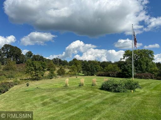 Rolling land, beautiful landscape, and amazing views surround this home. What a peaceful spot!