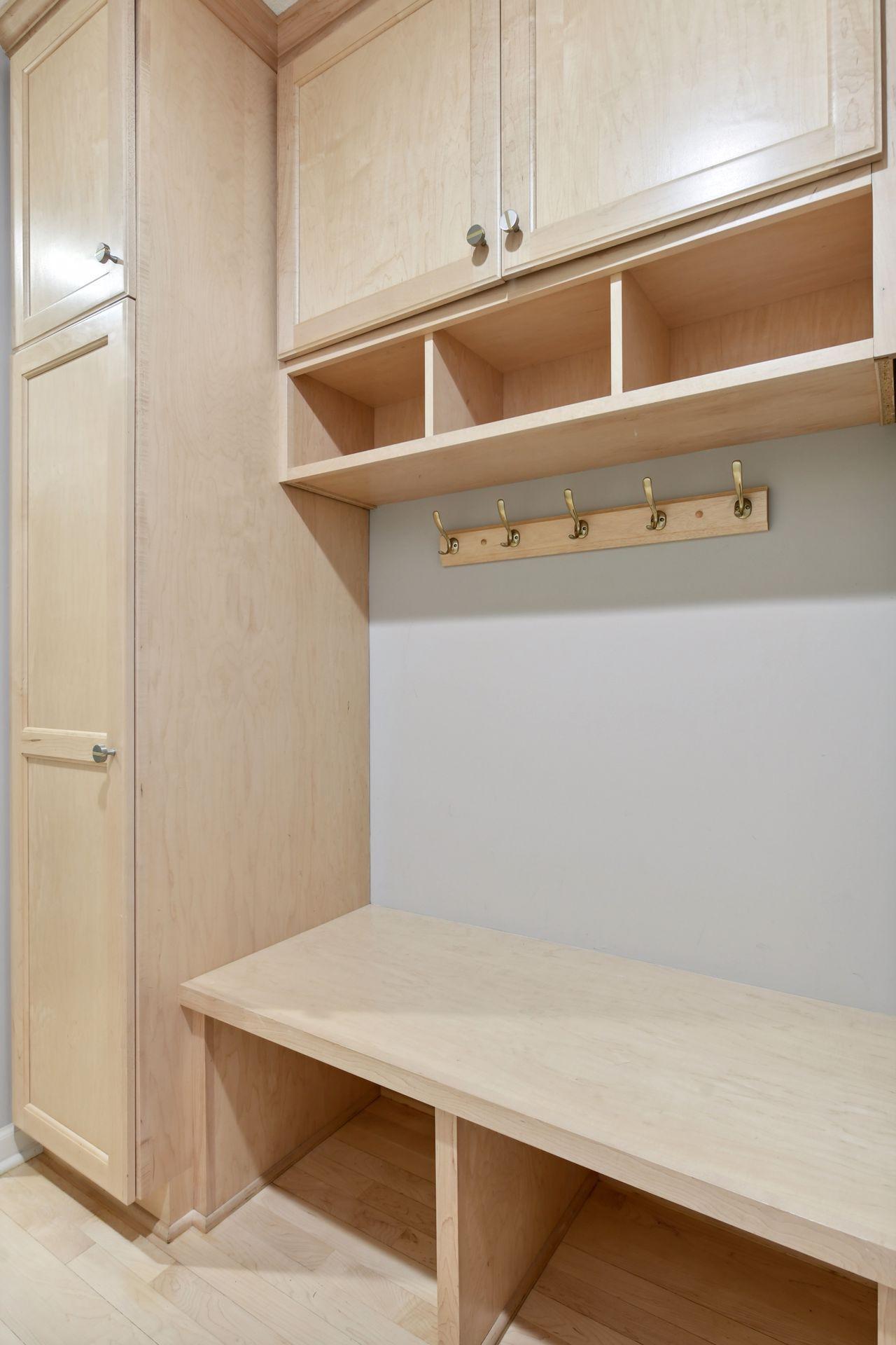 Mudroom with built-in cabinetry.