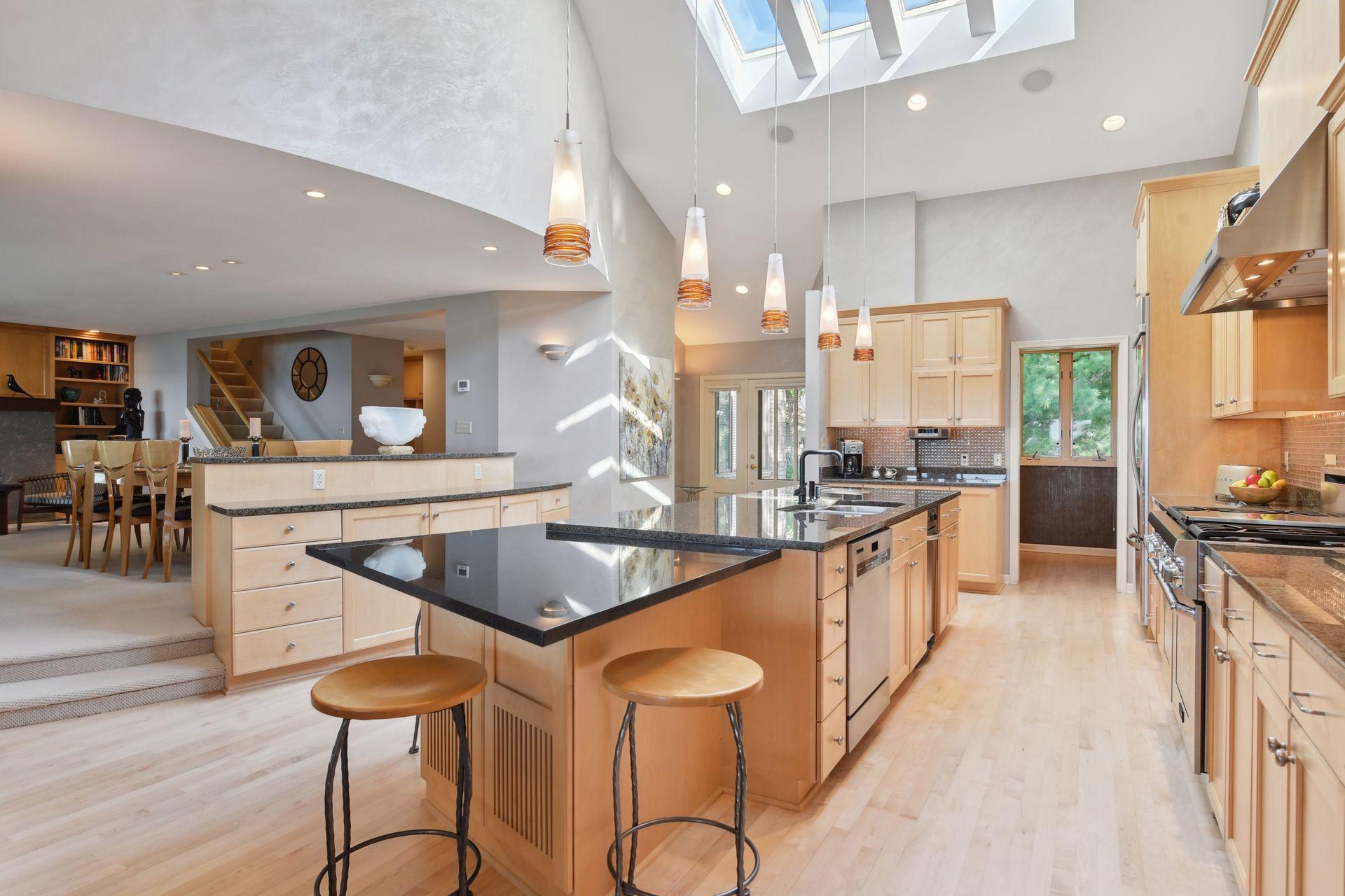 Main floor laundry in the room to the right of the coffee bar.