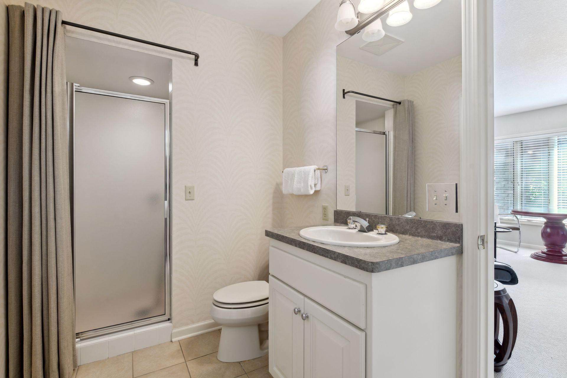 Main floor 3/4 ensuite bathroom.