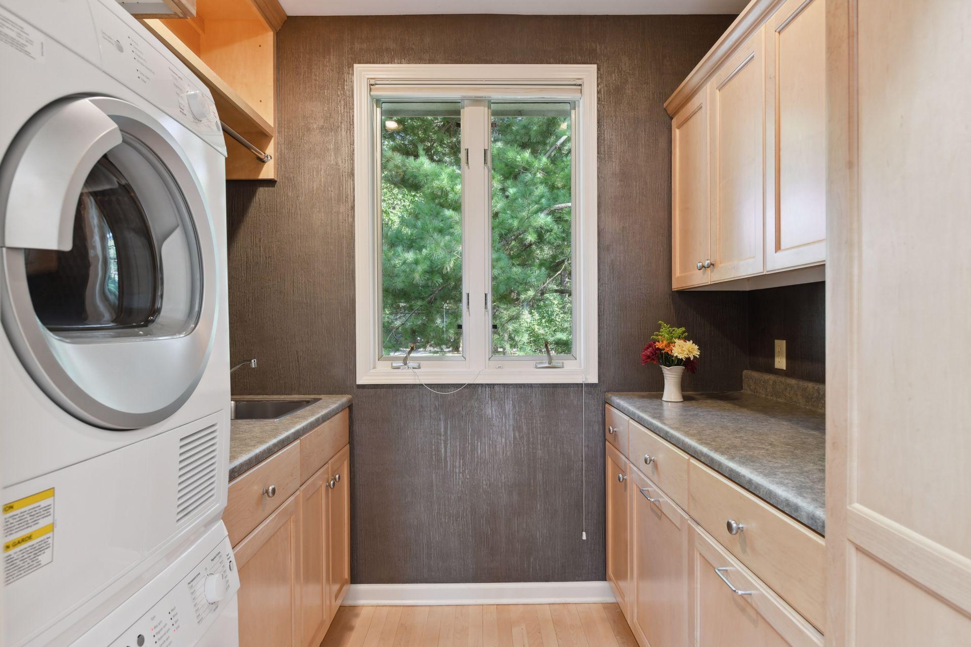 Laundry area off of the kitchen.