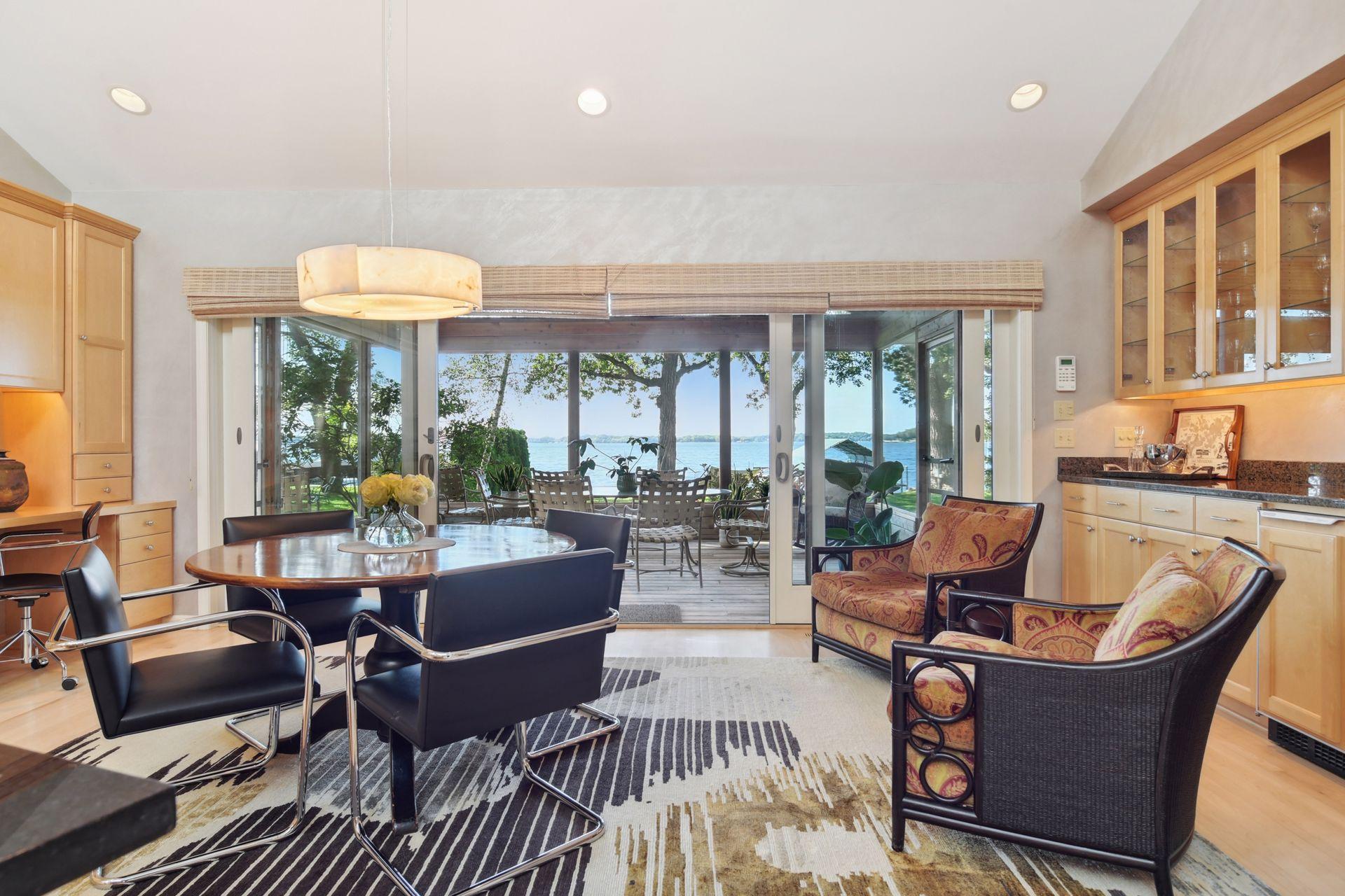 Large patio doors open to screen porch.