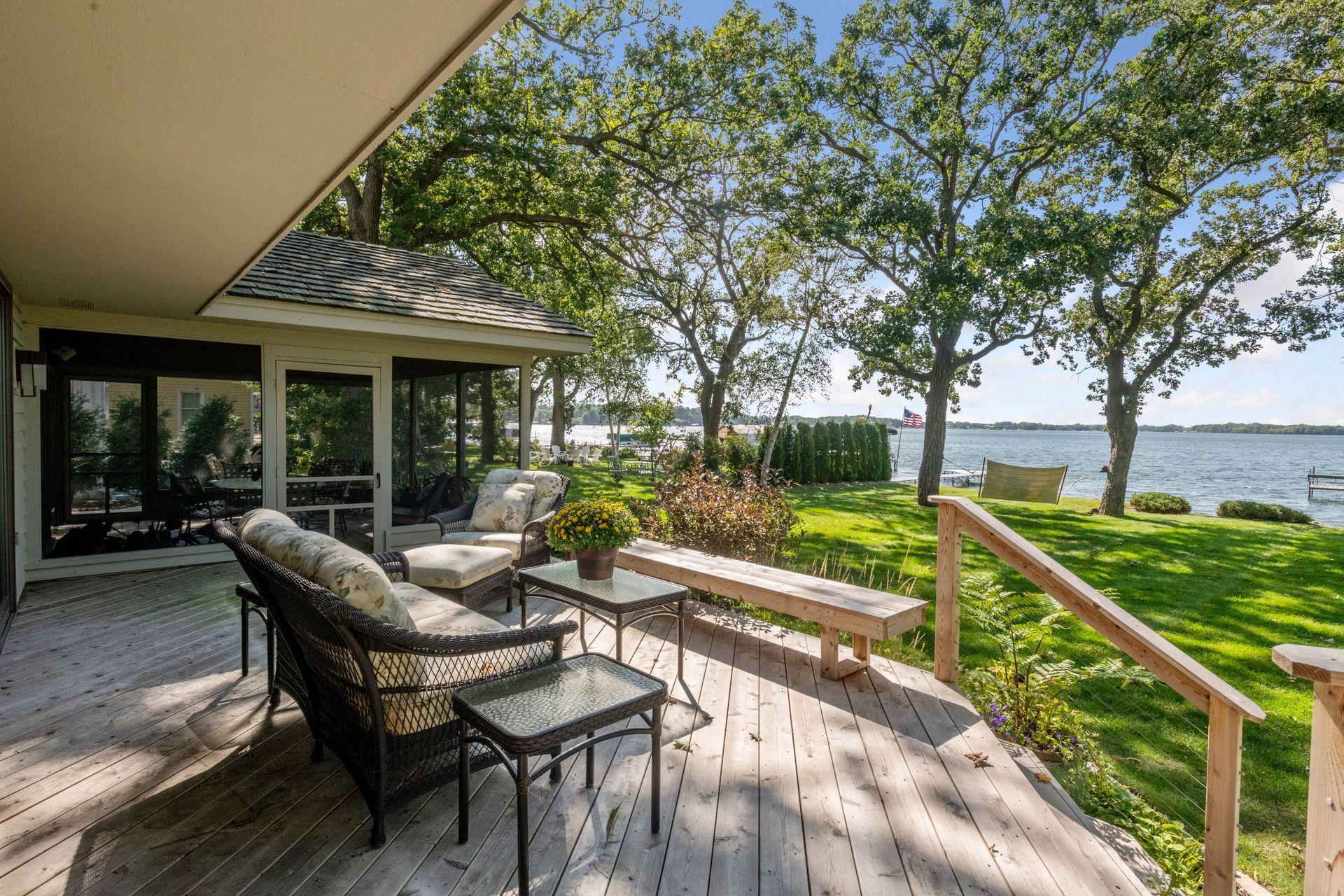 A beautiful deck and screened porch to enjoy the summer months!