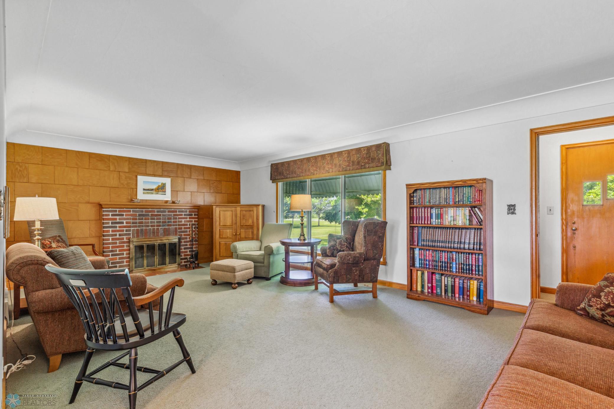 Main Floor Living Room w/ Woodburning Fireplace