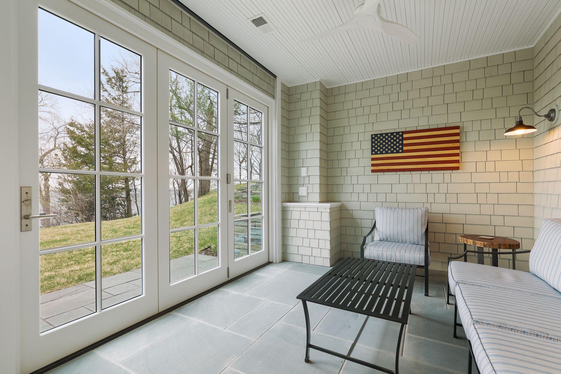 Porch with sliding doors and phantom screens.