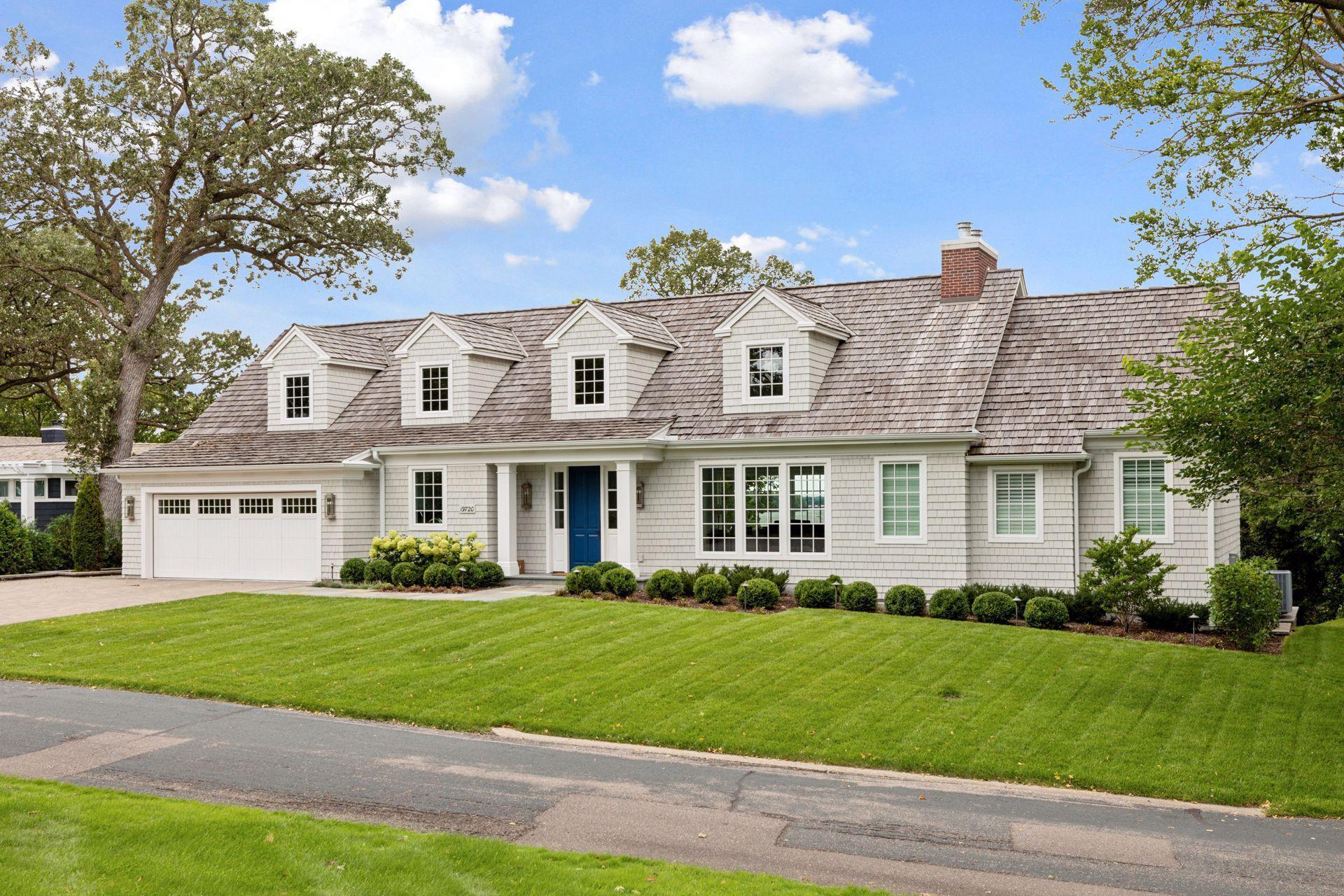 Instead of a third car space there is a huge storage area off of patio on the lakeside.
