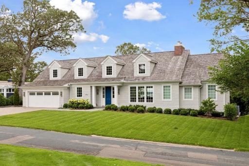 Instead of a third car space there is a huge storage area off of patio on the lakeside.