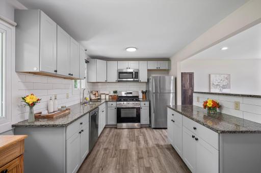 Photo for 1007 38th Avenue, Anoka, MN 55303 - listing #6600965 Please be our guests @ an open house this weekend~This updated kitchen has granite counters, stainless steel appliances and newer cabinets with ample space to prepare and host gatherings.