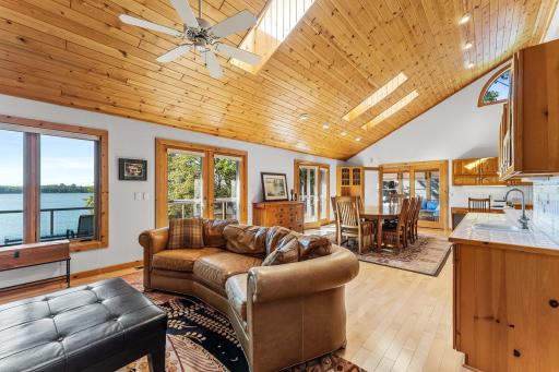 Laminated Maple Flooring in Living Room, Dinning Room, and Kitchen