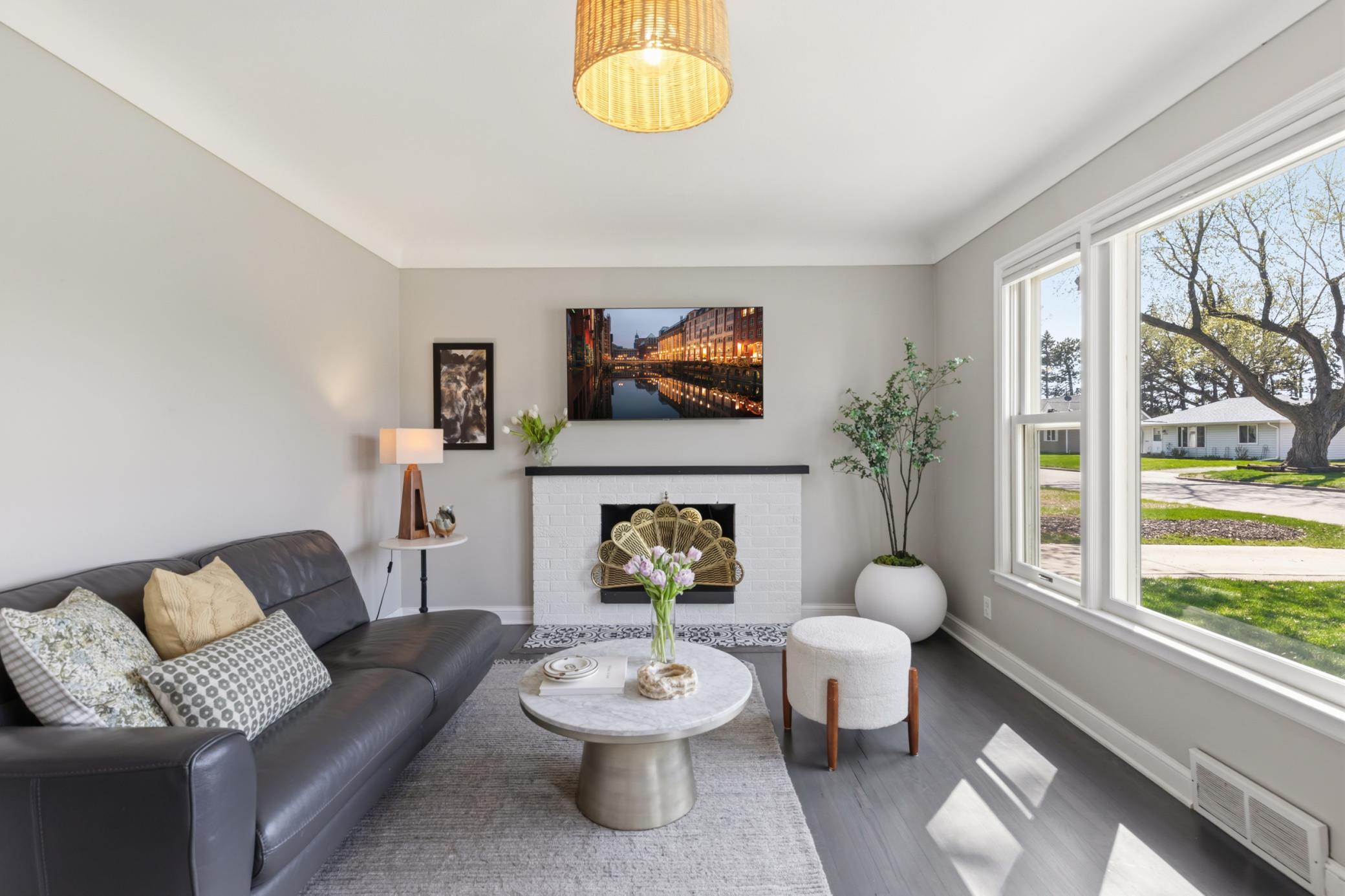 Living room's wood burning fireplace has a newer chimney liner (2023)