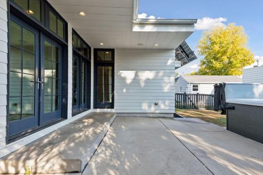French doors lead from the dining room to the patio along with a separate entrance into the mudroom area.