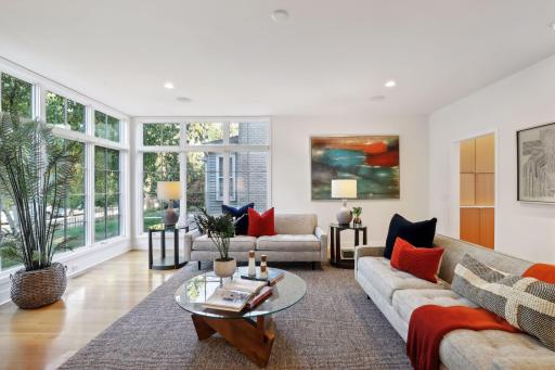 9' ceiling height on main level, recessed lighting, and built-in speakers.