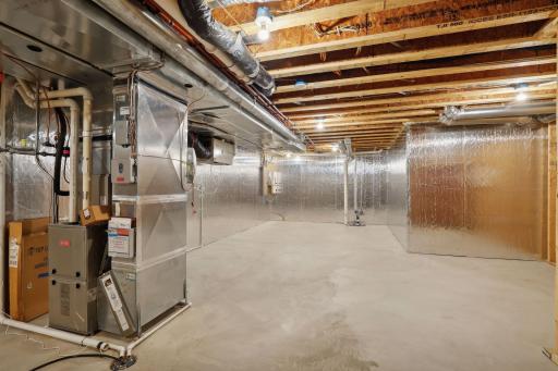 Excellent storage space or expansion opportunity in the lower level utility room.