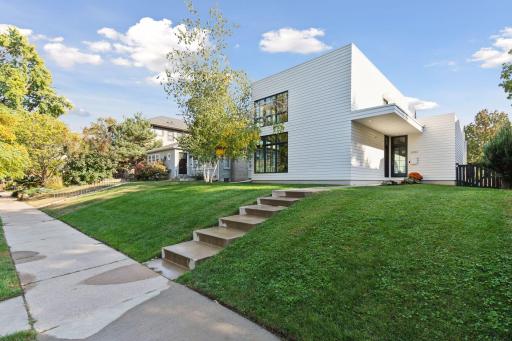 Stunning modern newer construction in the coveted Cedar-Isles-Dean neighborhood!