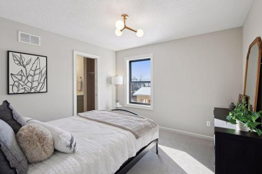 Upper level bedroom #3 w/ private en-suite bath.