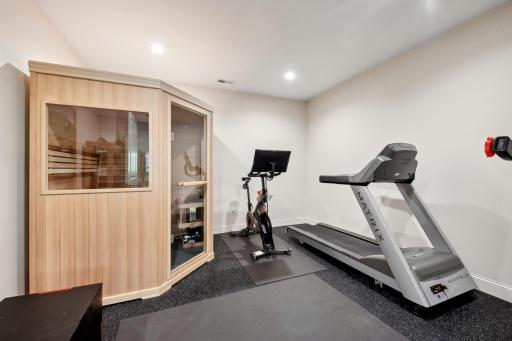 The sellers added this exercise room complete with a sauna (not included)