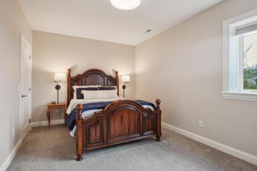 This bedroom features a large walk in closet.