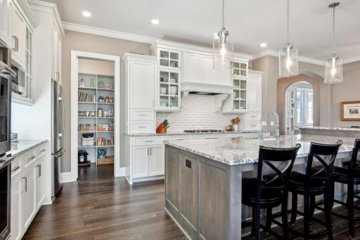 The walk-in pantry will easily house your groceries and small kitchen appliances