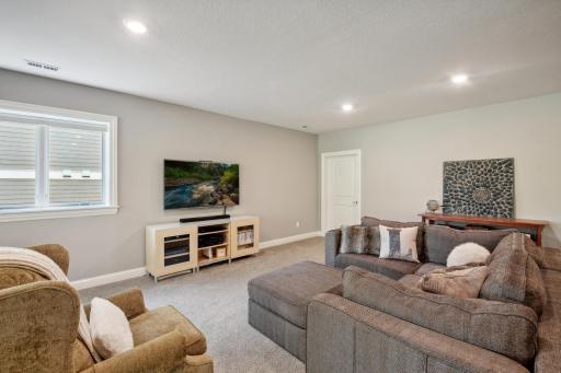 The spacious lower level family room will comfortably accomodate a crowd