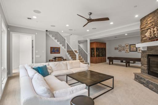 The lower level of this home is designed to be an entertainer's dream, with a wealth of luxurious features and spaces that cater to your every desire.