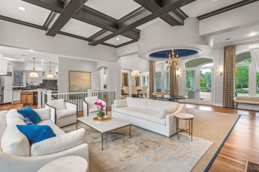 The main level of this home boasts stunning re-finished Brazilian Cherry hardwood floors that add warmth and richness to the space, and 10-foot ceilings offering a sense of grandeur and spaciousness.