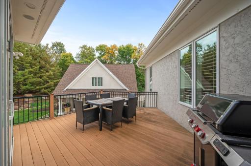 Hearth room provides access to a private maintenance-free deckâa perfect spot to unwind and enjoy the surroundings.