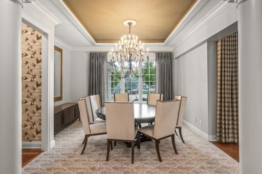 A magnificent chandelier graces the formal dining room, and a convenient butler's pantry with a warming drawer enhances your hosting capabilities.