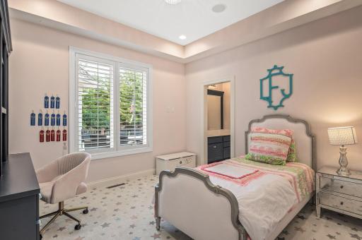 View of bedroom #3 - Beautiful plantation shutters adorn most of the windows, allowing you to control the natural light and privacy while adding a touch of classic elegance.