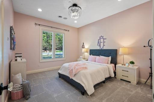 Two generously sized bedrooms on the lower level come complete with walk-in closets.
