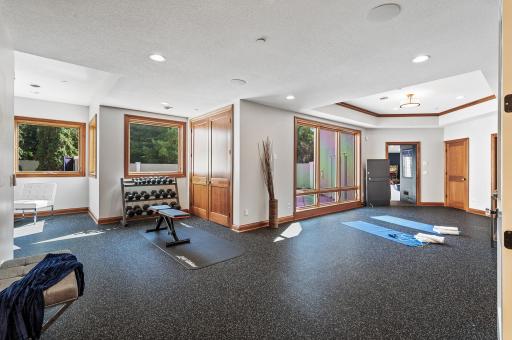 Fitness enthusiasts will appreciate the enormous workout room with rubber floors, providing a comfortable and well-equipped space for staying active.