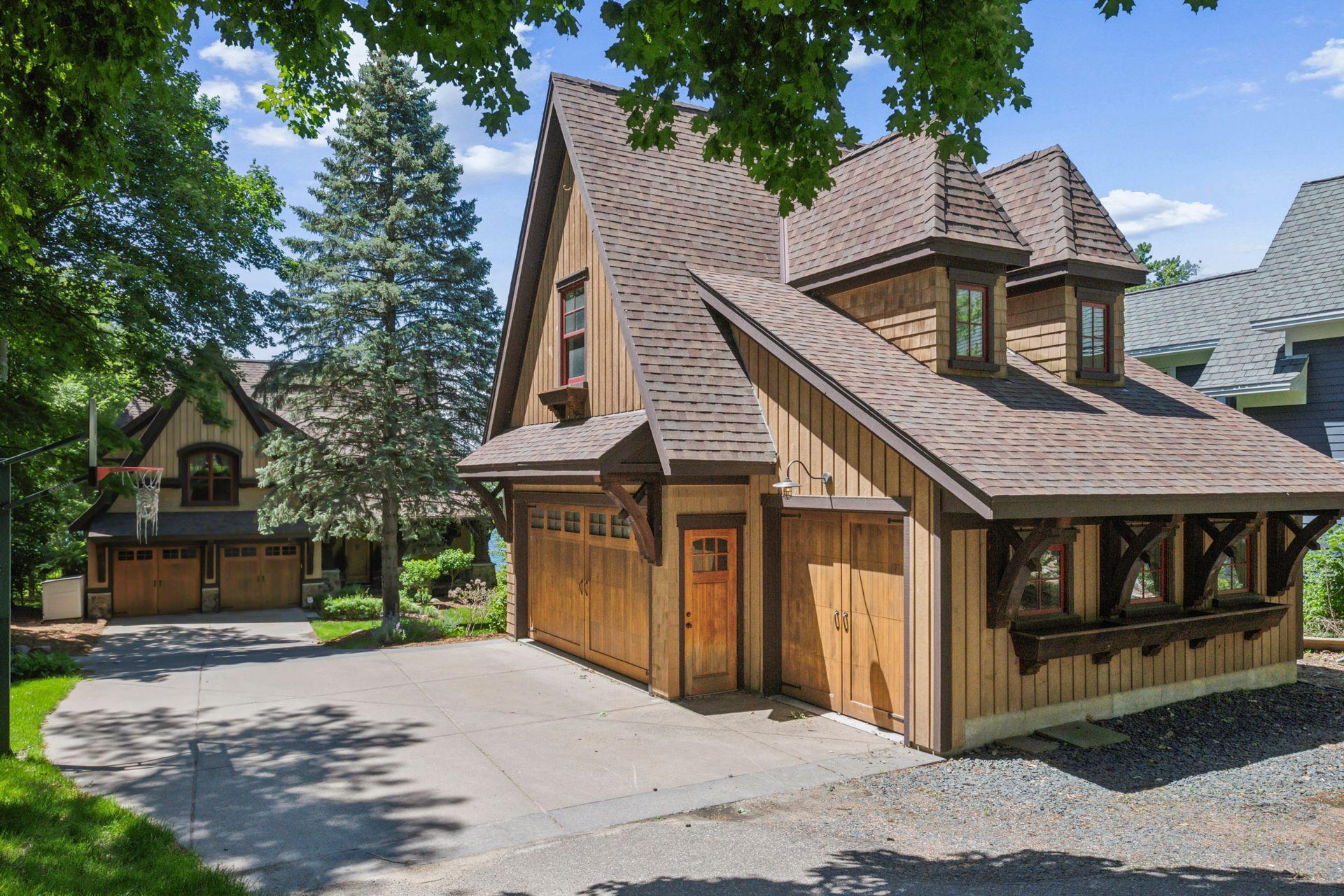 In addition to the attached garage, the property features a finished and heated 3-car garage. Above the garage you will find an additional 380 SF of finished studio space. The current owners used it as a gym.