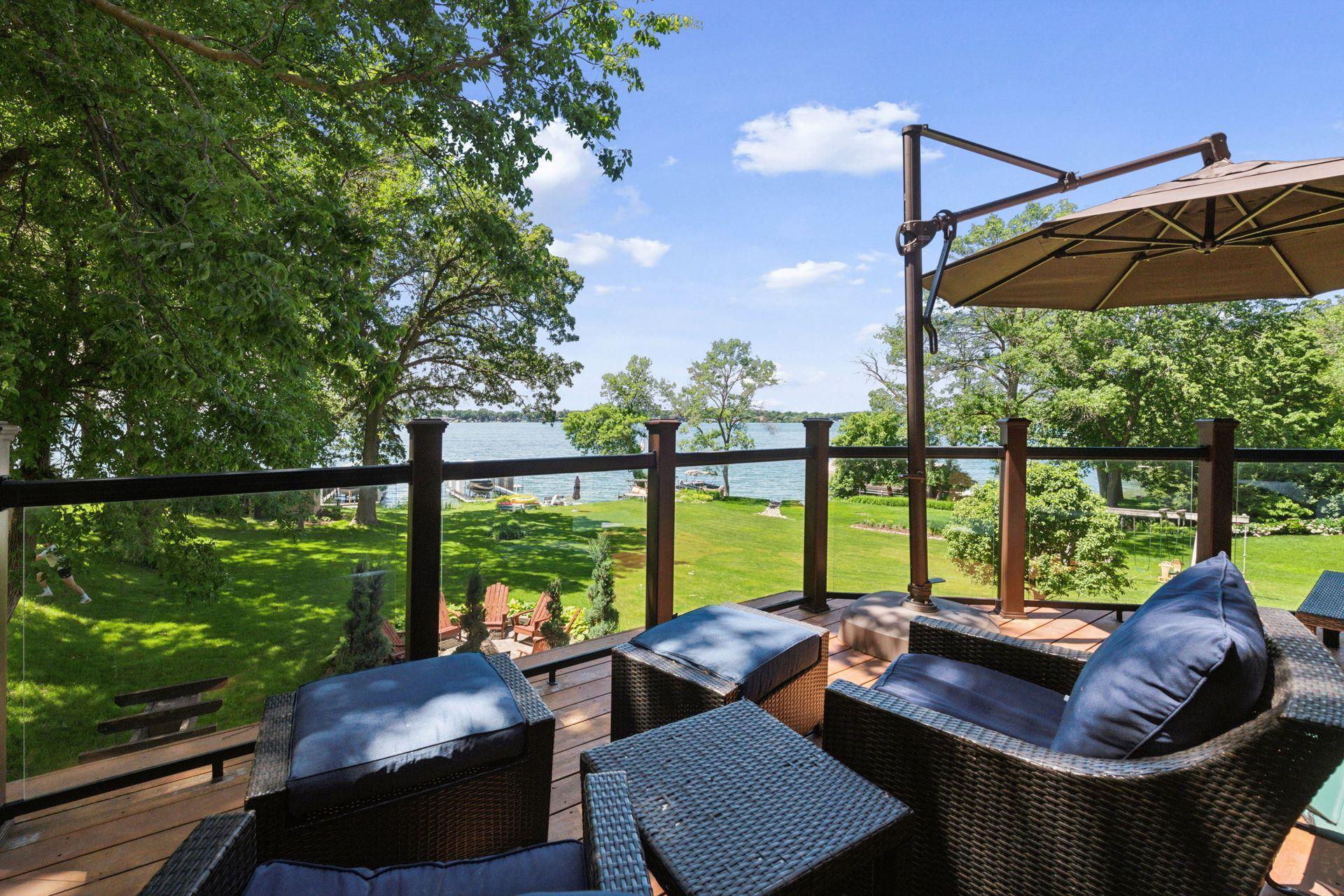 Connect with family and friends on the spacious Deck that overlooks the yard and lake.