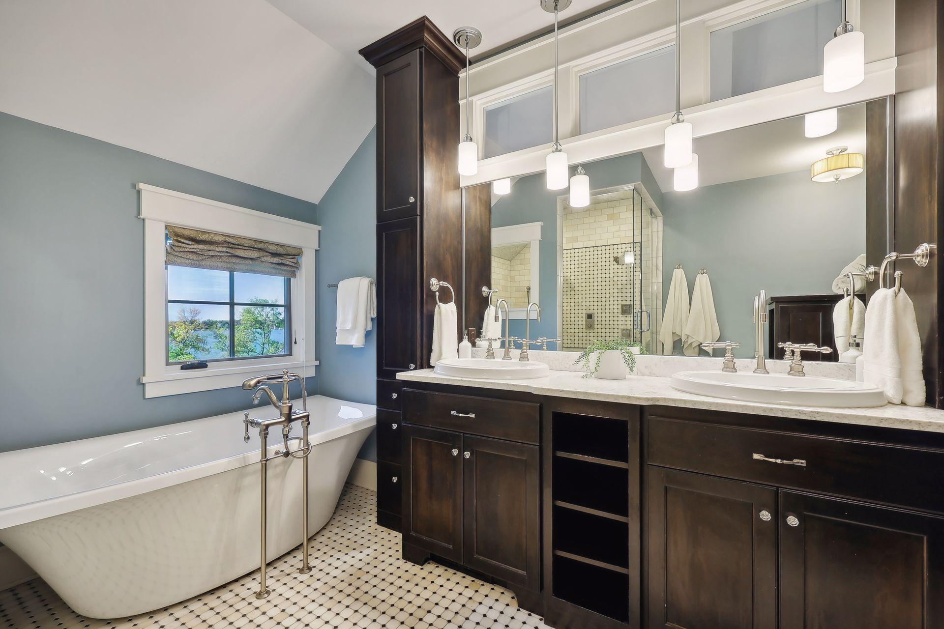 The impressive vanity features his & her sinks.