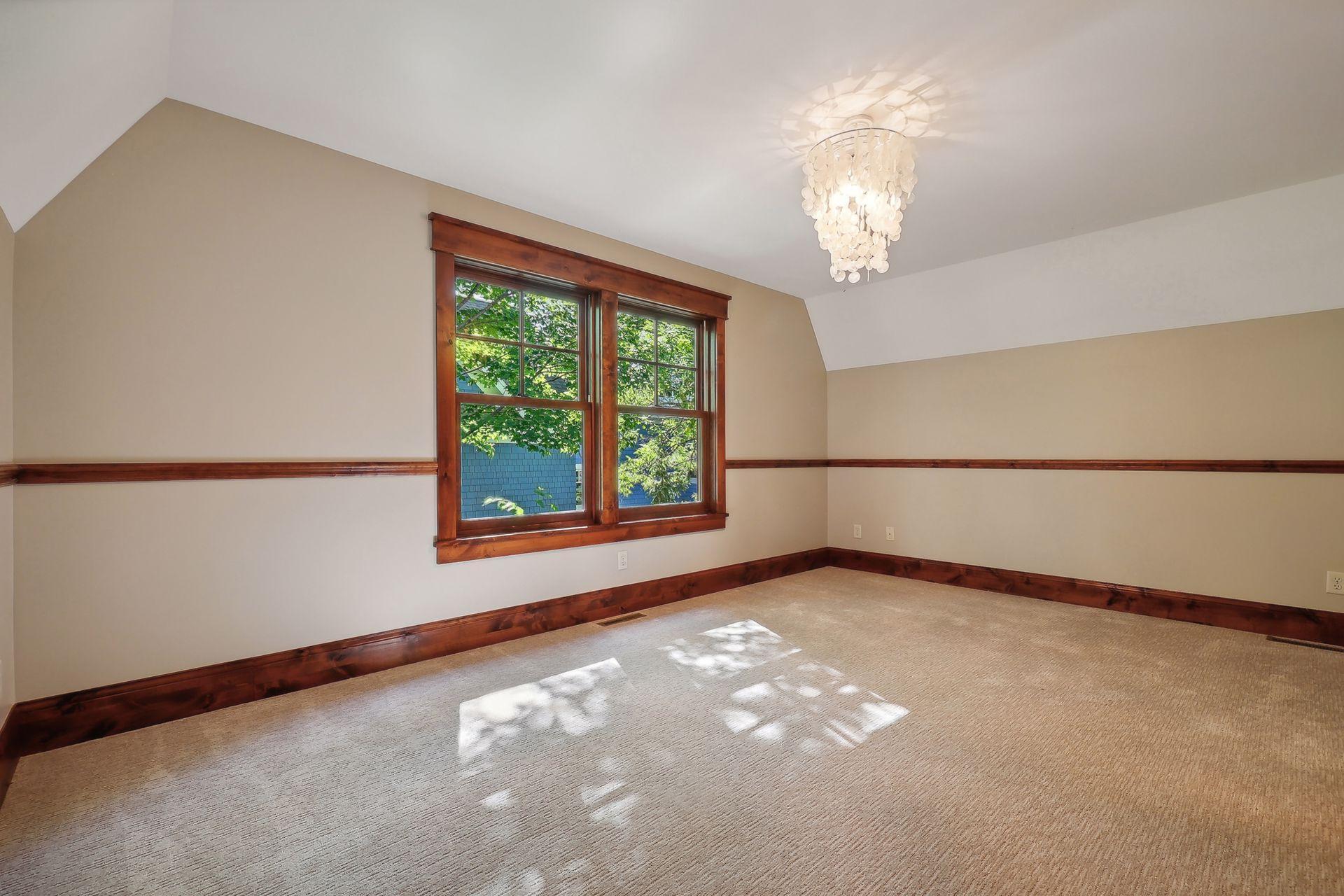 Junior Bedroom #2 enjoys handcrafted millwork and two closets with custom organizer systems.