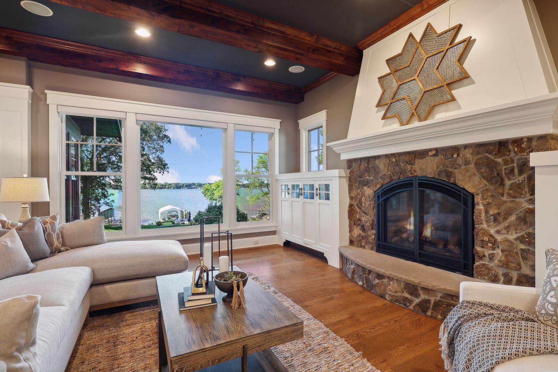 Expertly crafted and loaded with character and charm, this custom home blends rustic finishes with luxurious amenities. Enjoy commanding lake views from every room.