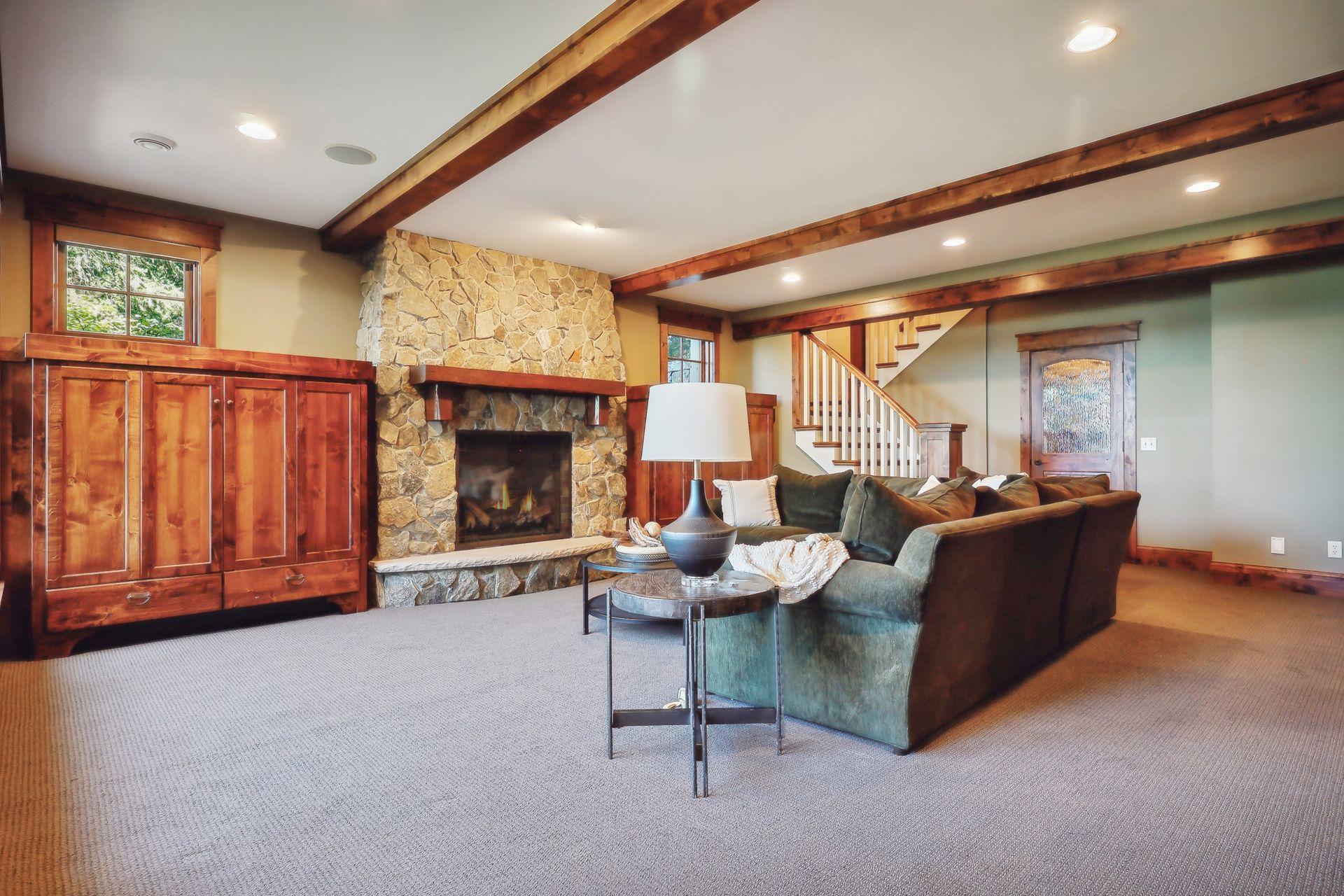 Fully finished, the lower level was designed for fun and entertainment with a large gas fireplace flanked by custom built-ins. 121.jpg