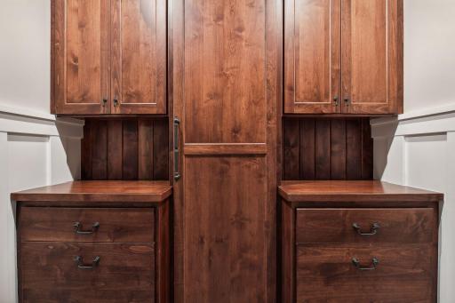 The upstairs Laundry Room is hidden behind this cabinet