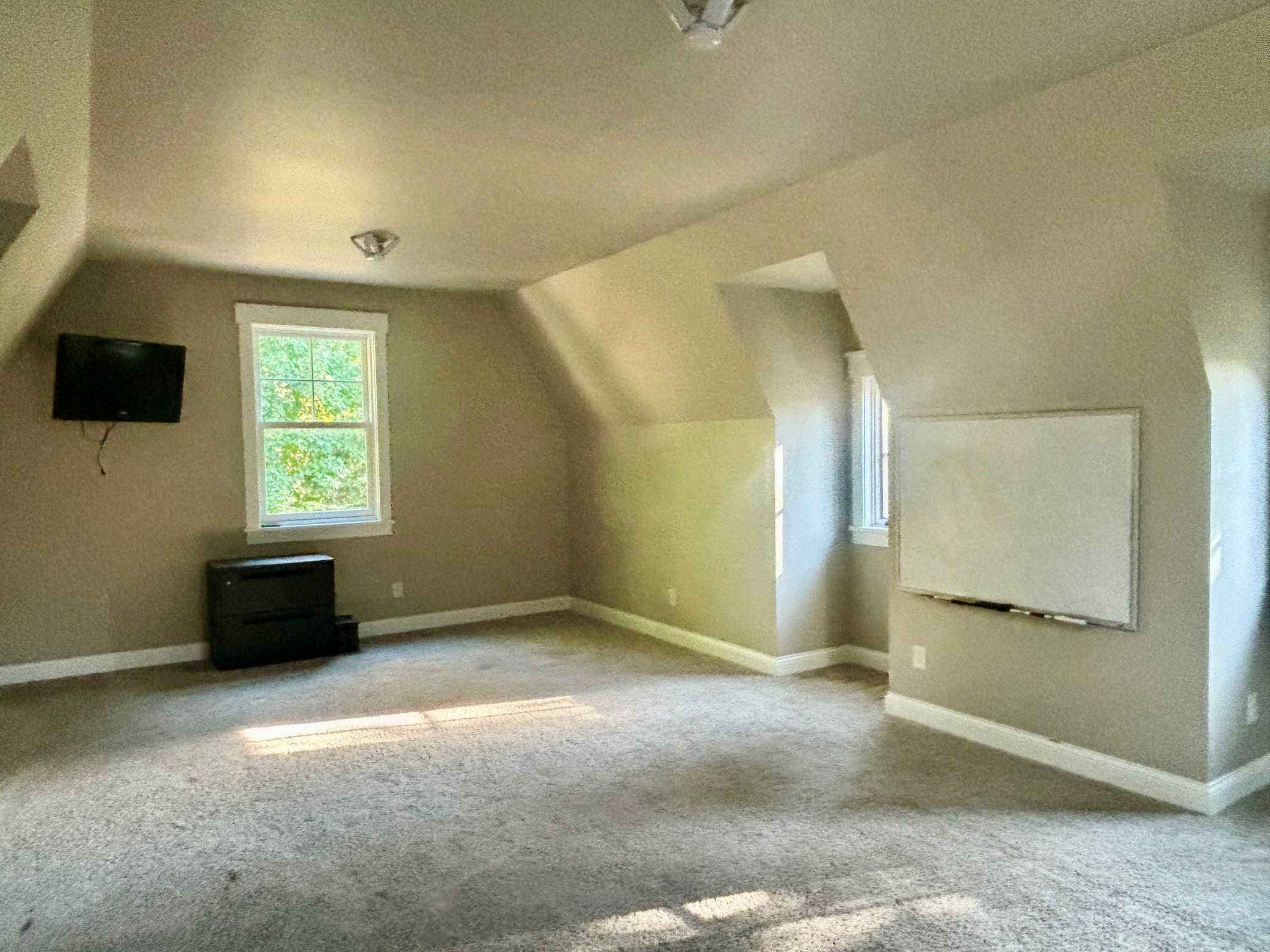 Finished space above the detached 3 car garage provides additional living