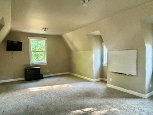 Finished space above the detached 3 car garage provides additional living