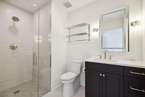 En-suite 3/4 bath in the secondary bedroom suite