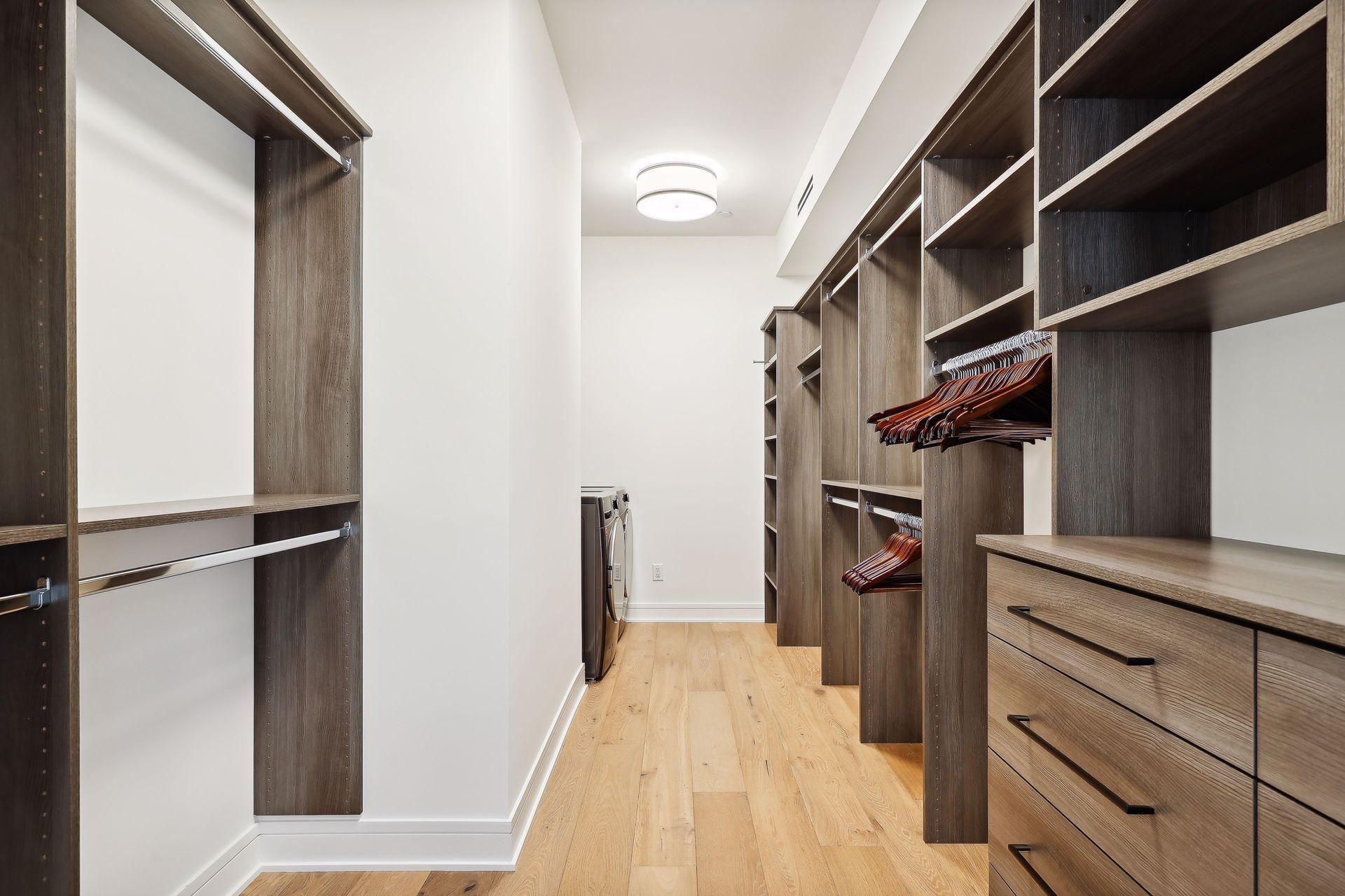 Large walk-in closet in the primary also conveniently holds the washer/dryer