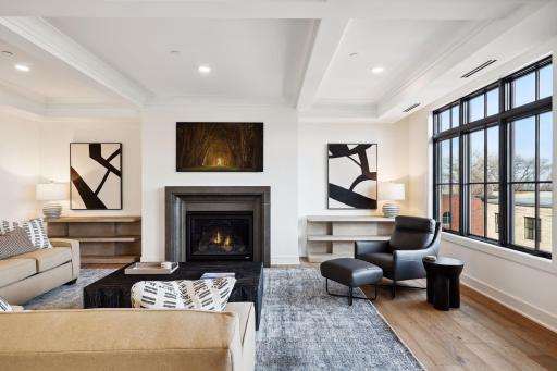 Gas fireplace anchors one end of the living room