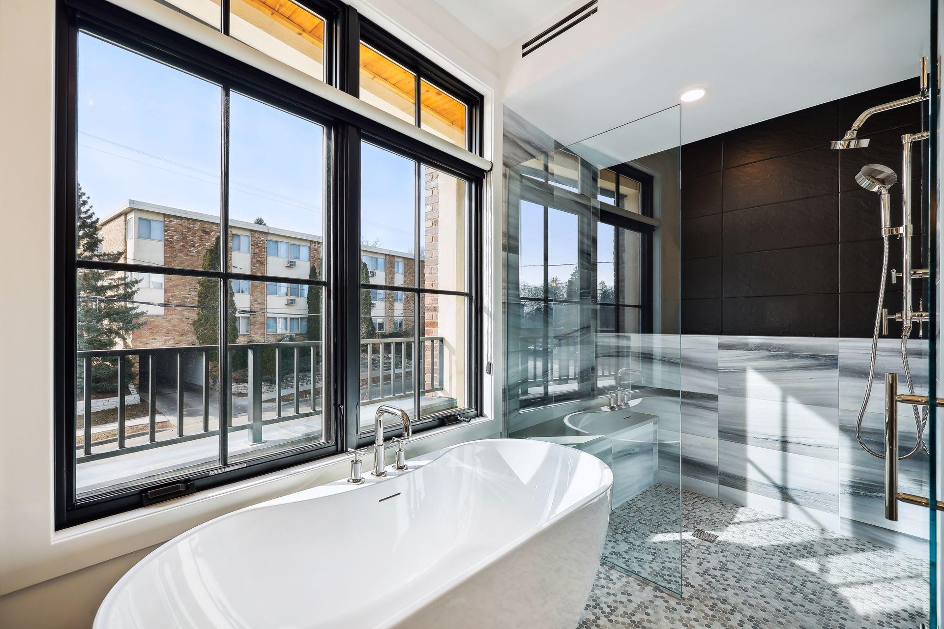 Over-sized walk-in shower (zero entry) with multiple shower heads