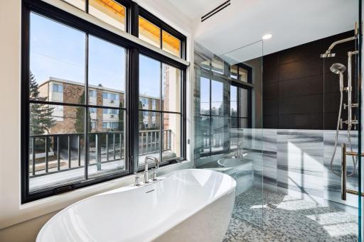 Over-sized walk-in shower (zero entry) with multiple shower heads